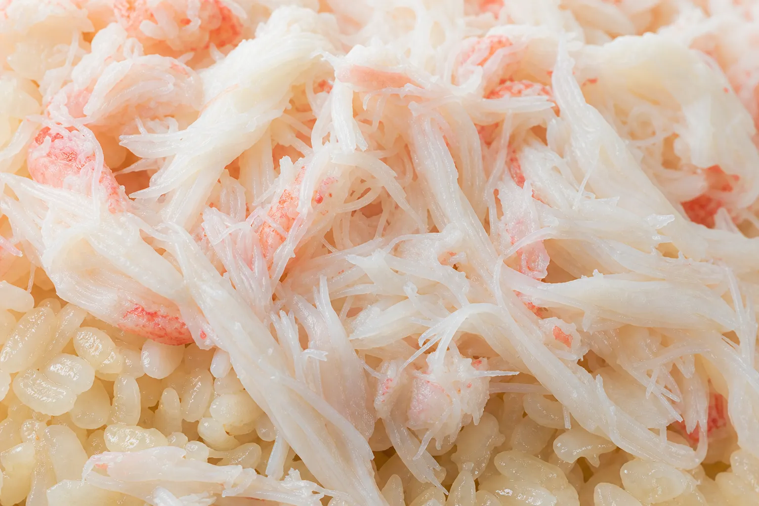Close-up of fluffy white Echizen snow-crab meat over rice