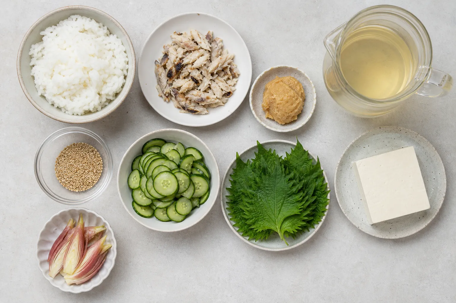 Grilled fish, miso, toasted sesame, cucumber and tofu laid out to make hiyajiru