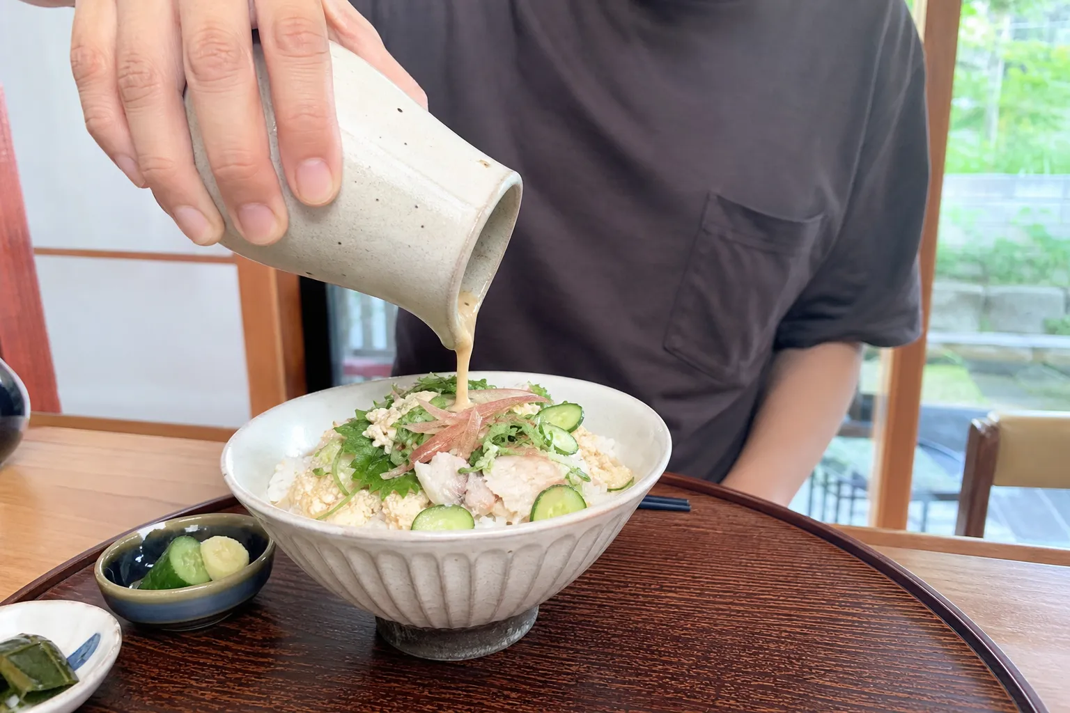 A bowl of cold hiyajiru over rice on a summer table in Miyazaki