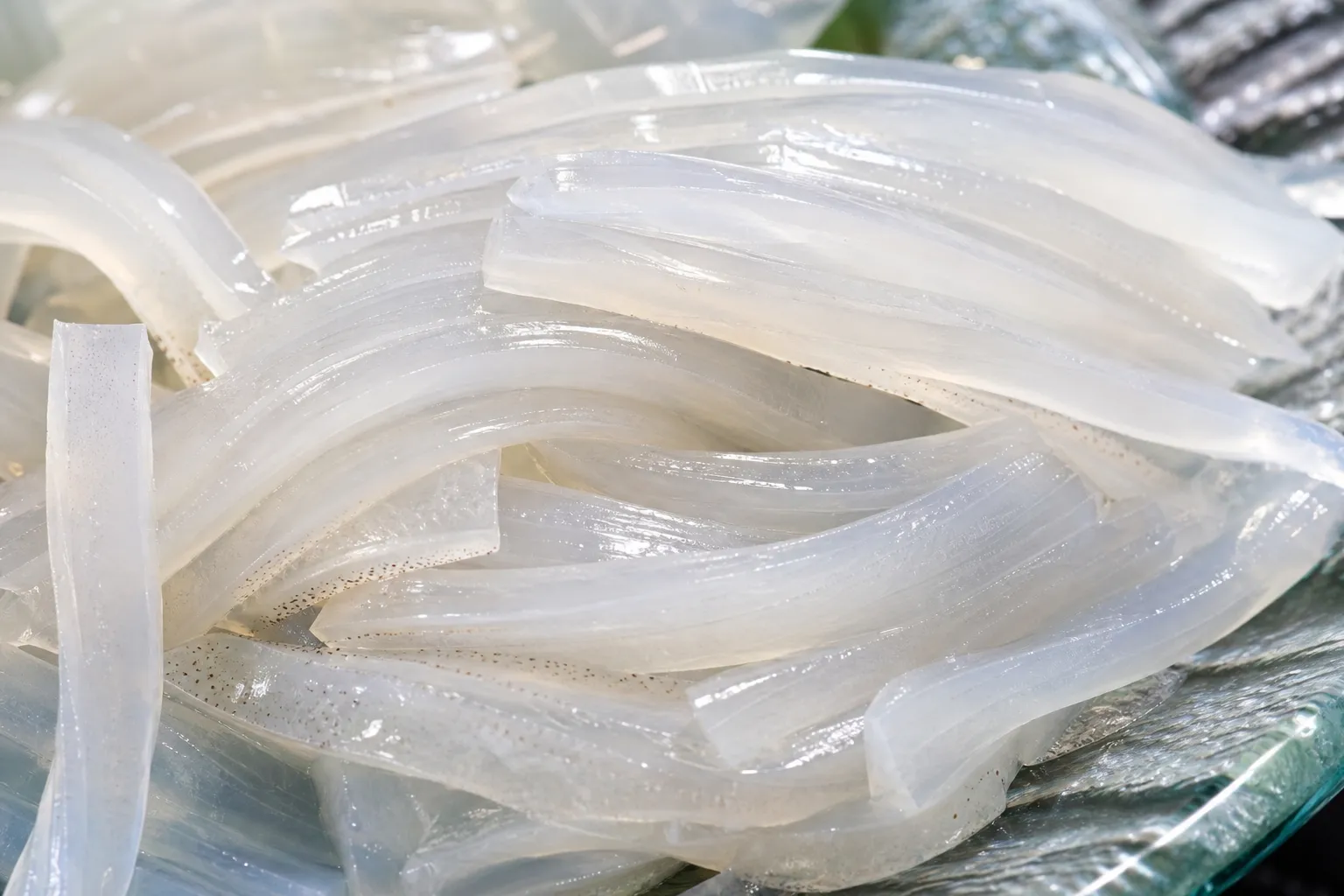 Close-up of transparent, glassy Yobuko squid sashimi